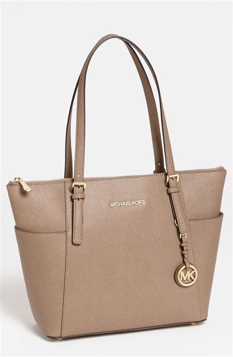 michael kors jet set large tote dark dune|Michael Kors bag with airplanes.